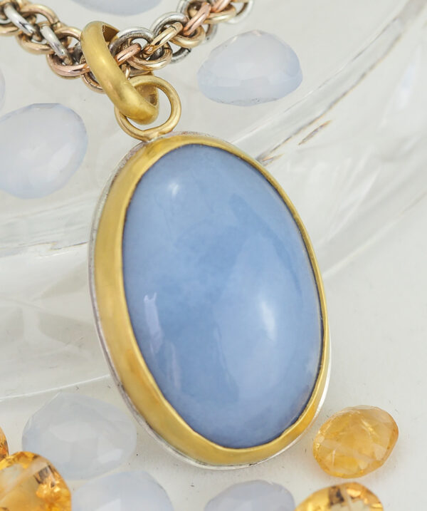 Blue Gemstone pendant face close up