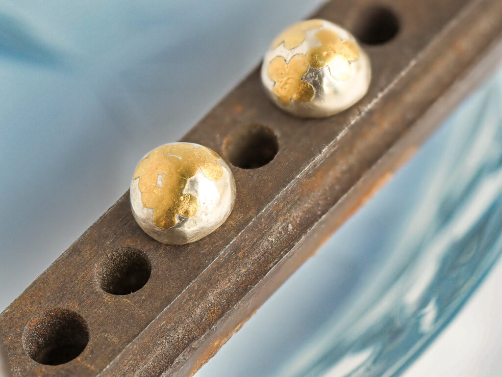 Gold gilded stud earrings by Donna Weaver