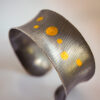 Wide Silver cuff bracelet with gold balls
