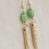 dangle earrings of green and white gemstones