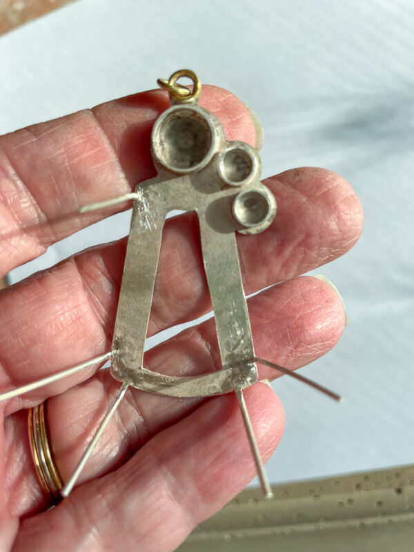 Handmade necklace frame construction with prongs