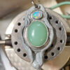 opal and chrysoprase pendant in stone setting