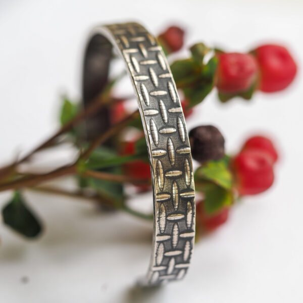 Silver cuff bracelet with berries