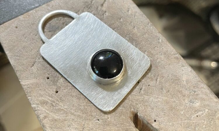 Restored silver and gemstone keychain