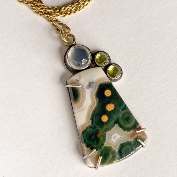Ocean Jasper gemstone pendant with moonstone and peridot on gold chain